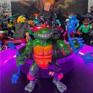 Vibrant Green and Red Action Figure with Accessories